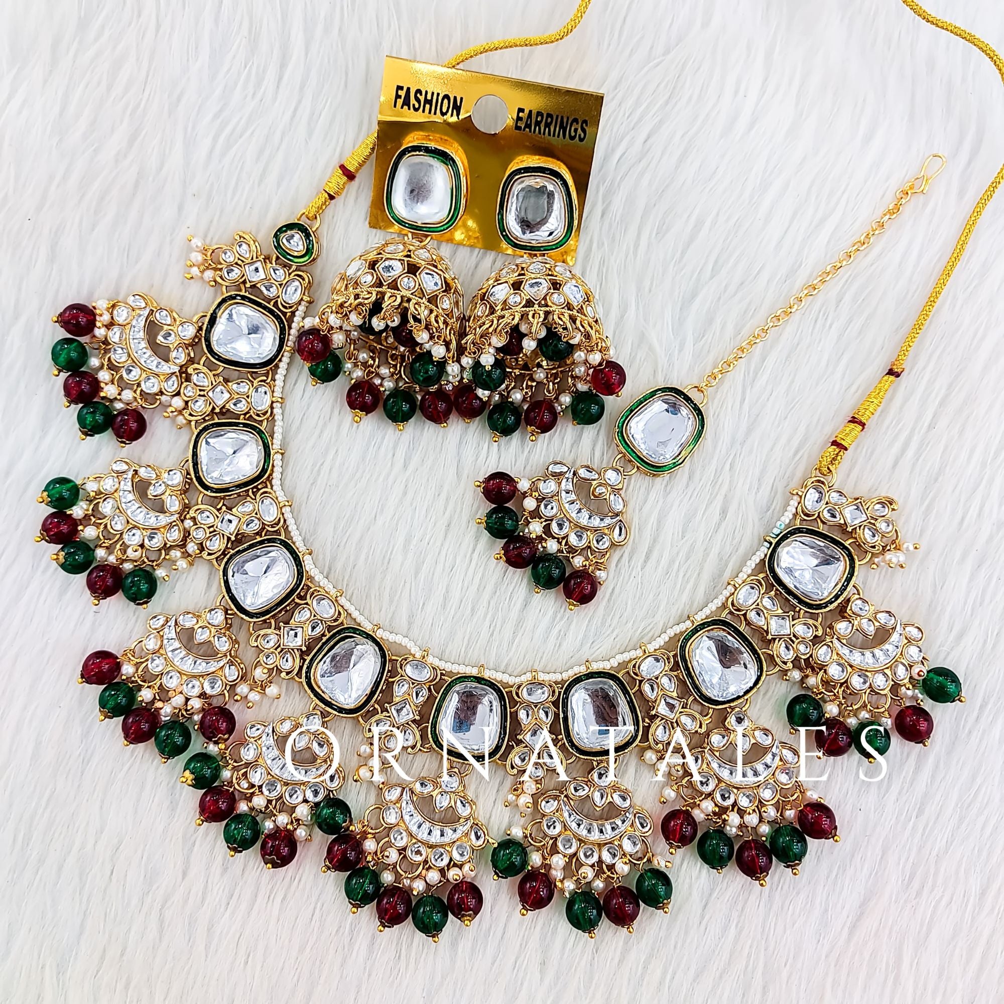 Emerald green and maroon Kundan Necklace Set with Chandbali layered design and pearl detailing – royal bridal jewellery – Ornatales