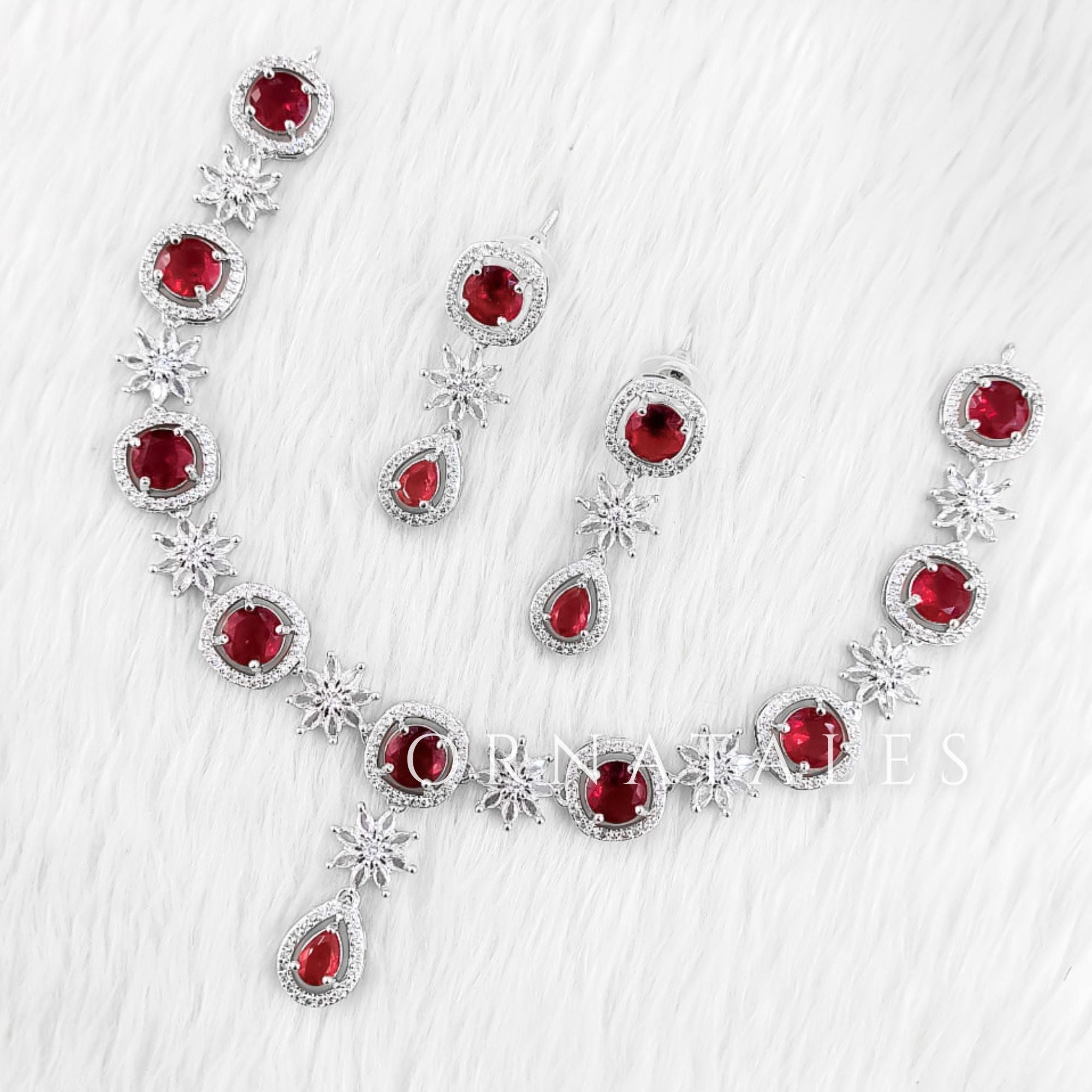 Ruby Red Diamond Cut Necklace Set with starburst motif and teardrop accents – Ornatales
