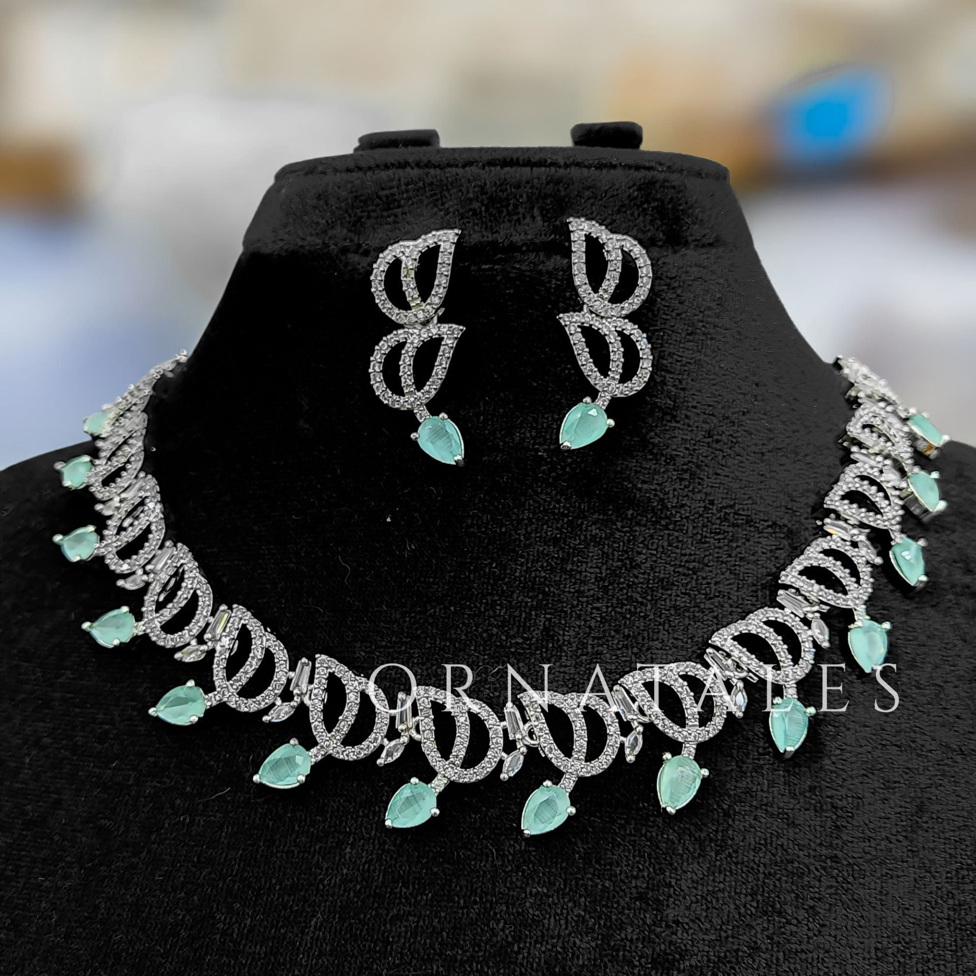 Mint Diamond Cut Spiral Necklace Set with droplet stones and matching earrings – elegant swirl design – Ornatales
