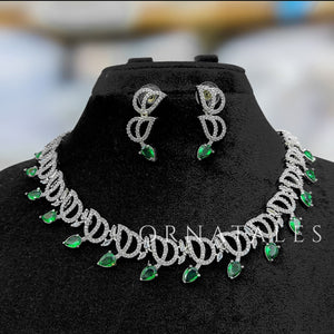 Emerald Green Diamond Cut Necklace Set with interlinked round loops, droplet stones, and matching earrings – bridal & festive jewellery – Ornatales