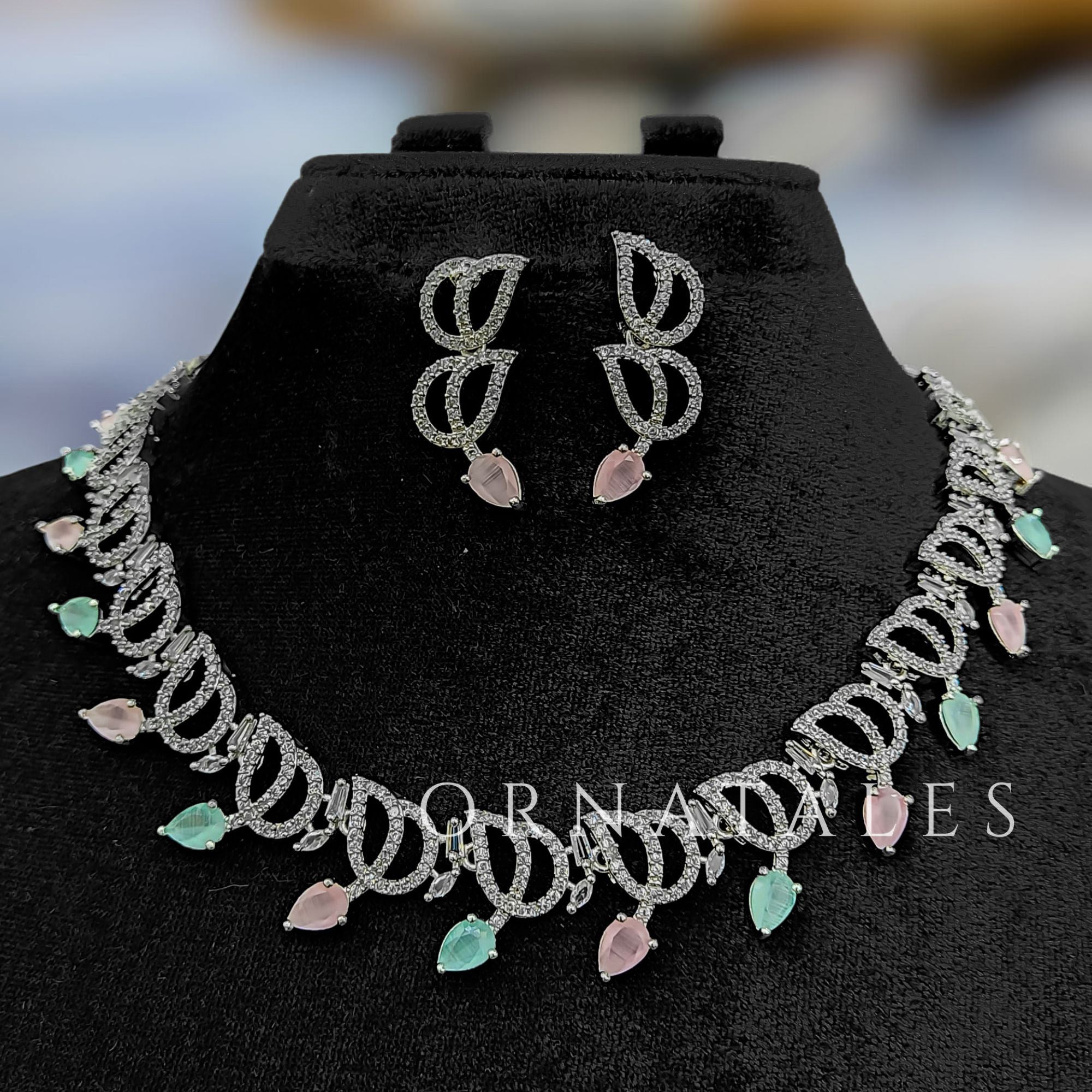 Pink & Mint DiamondCut Necklace Set with wave-like looping structure and droplet stones – matching earrings – Ornatales