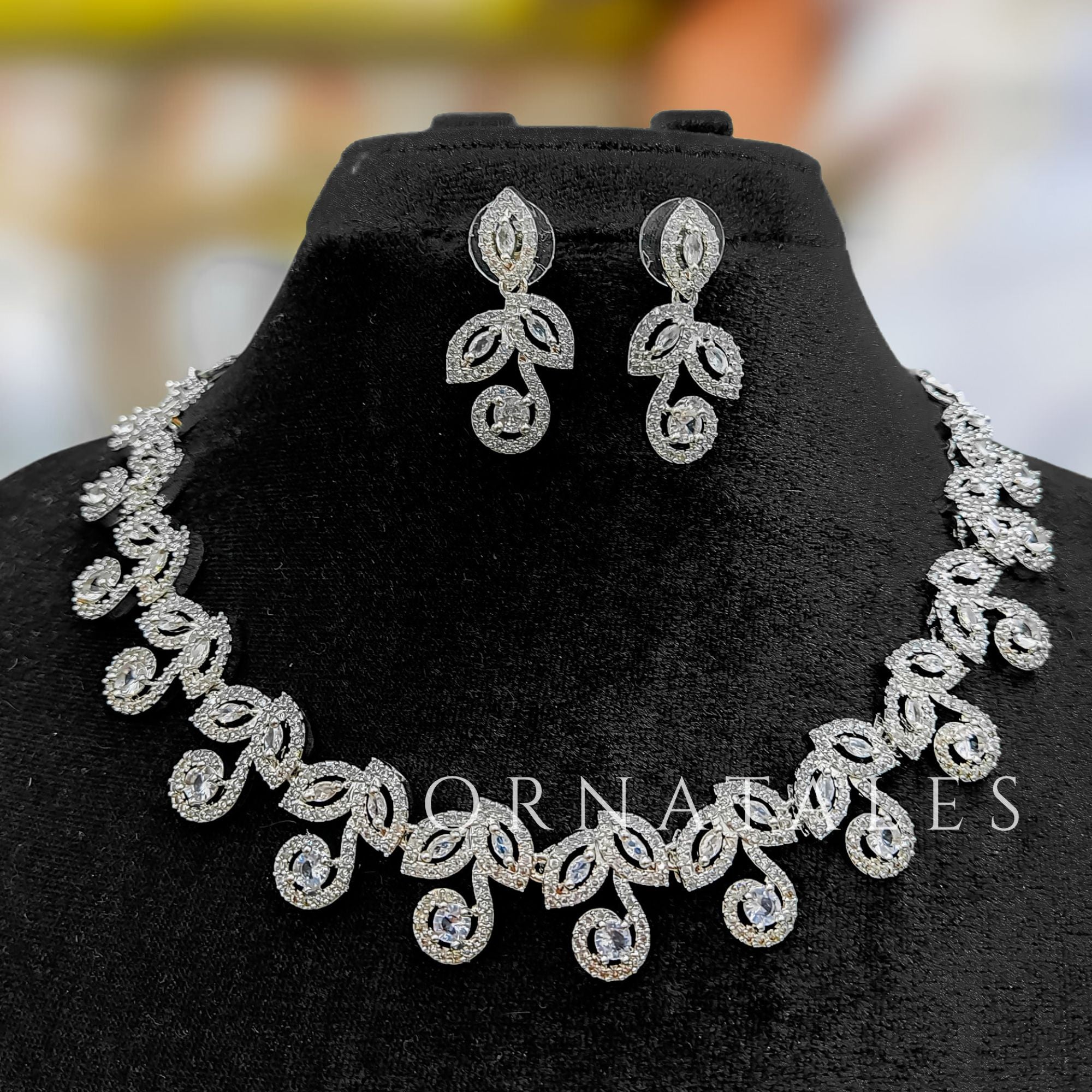 Crystal White Diamond Cut Necklace Set featuring Classic Bloom Cluster design with floral-inspired clustered motifs and diamond halos – Perfect for Bridal & Festive Look – Ornatales