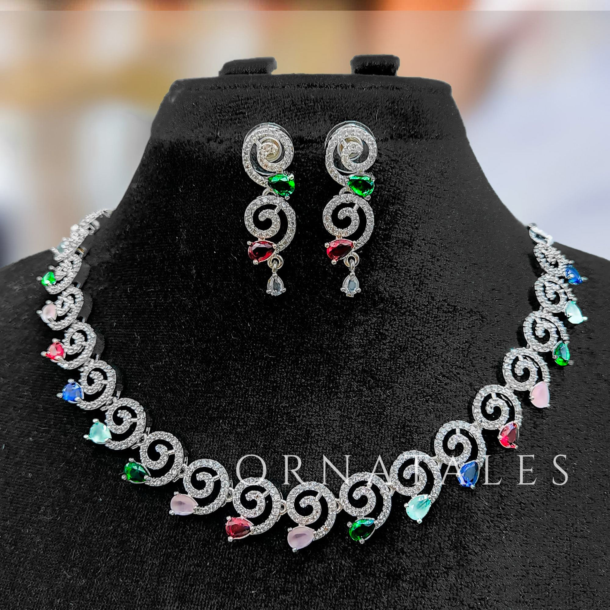 Multicolor Diamond Cut Spiral Necklace Set featuring spiral motifs with colorful stones and matching earrings – festive jewellery – Ornatales