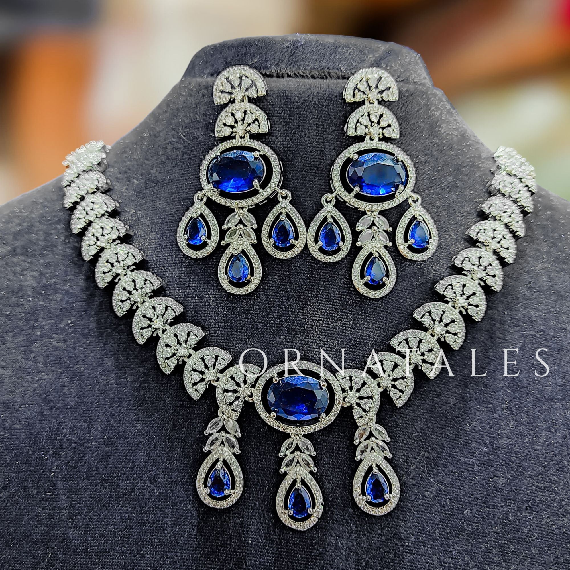 Royal Blue Diamond Cut Necklace Set featuring Regal Drop Symphony design with oval stones and teardrop accents – Perfect for Bridal Look – Ornatales