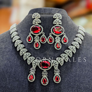 Ruby Red Diamond Cut Necklace Set featuring Regal Drop Symphony design with oval stones and teardrop accents – Perfect for Bridal Look – Ornatales