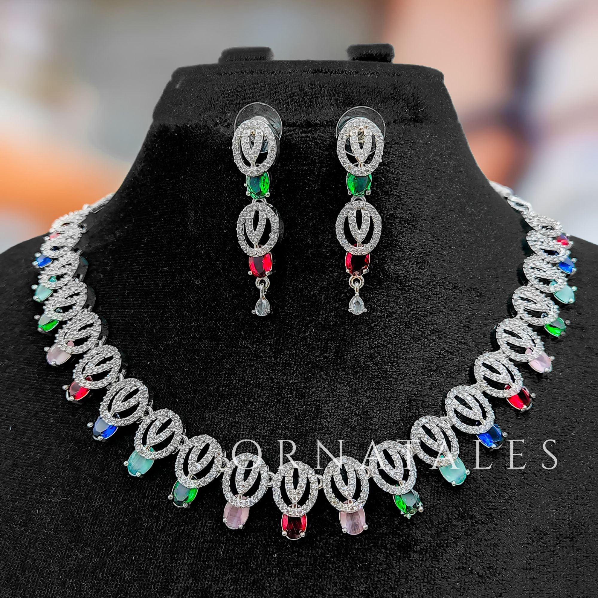 Multicolor Diamond Cut Necklace Set featuring spiral motifs with teardrop stones – Ornatales