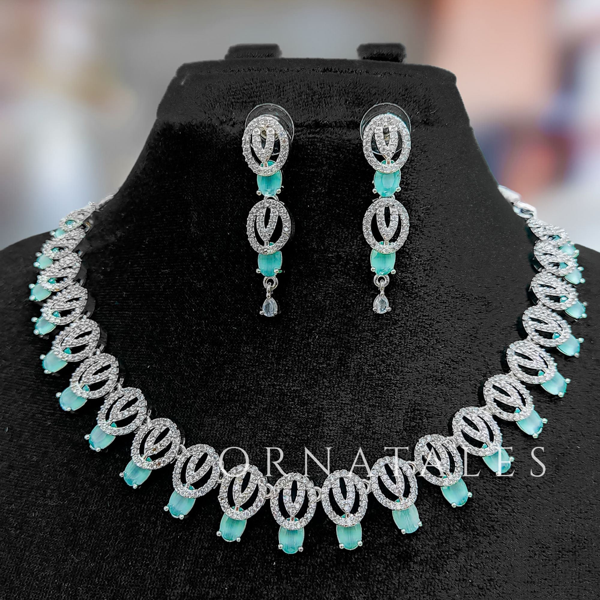Mint Diamond Cut Necklace Set featuring spiral motifs with teardrop stones – Ornatales