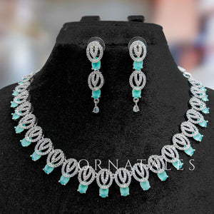 Mint Diamond Cut Necklace Set featuring spiral motifs with teardrop stones – Ornatales