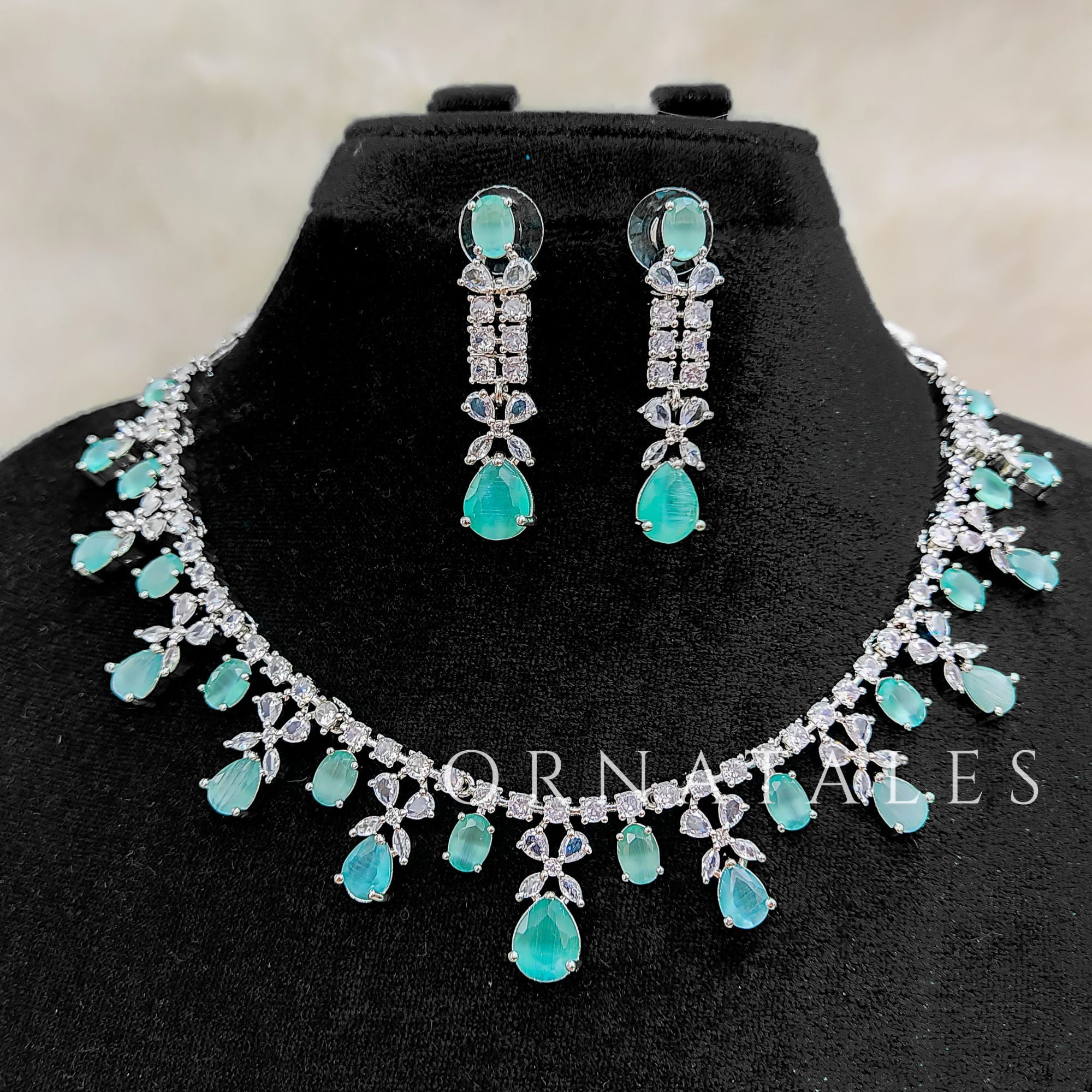 Mint Diamond Cut Necklace Set featuring cascading teardrop stones and clustered diamond detailing – Ornatales