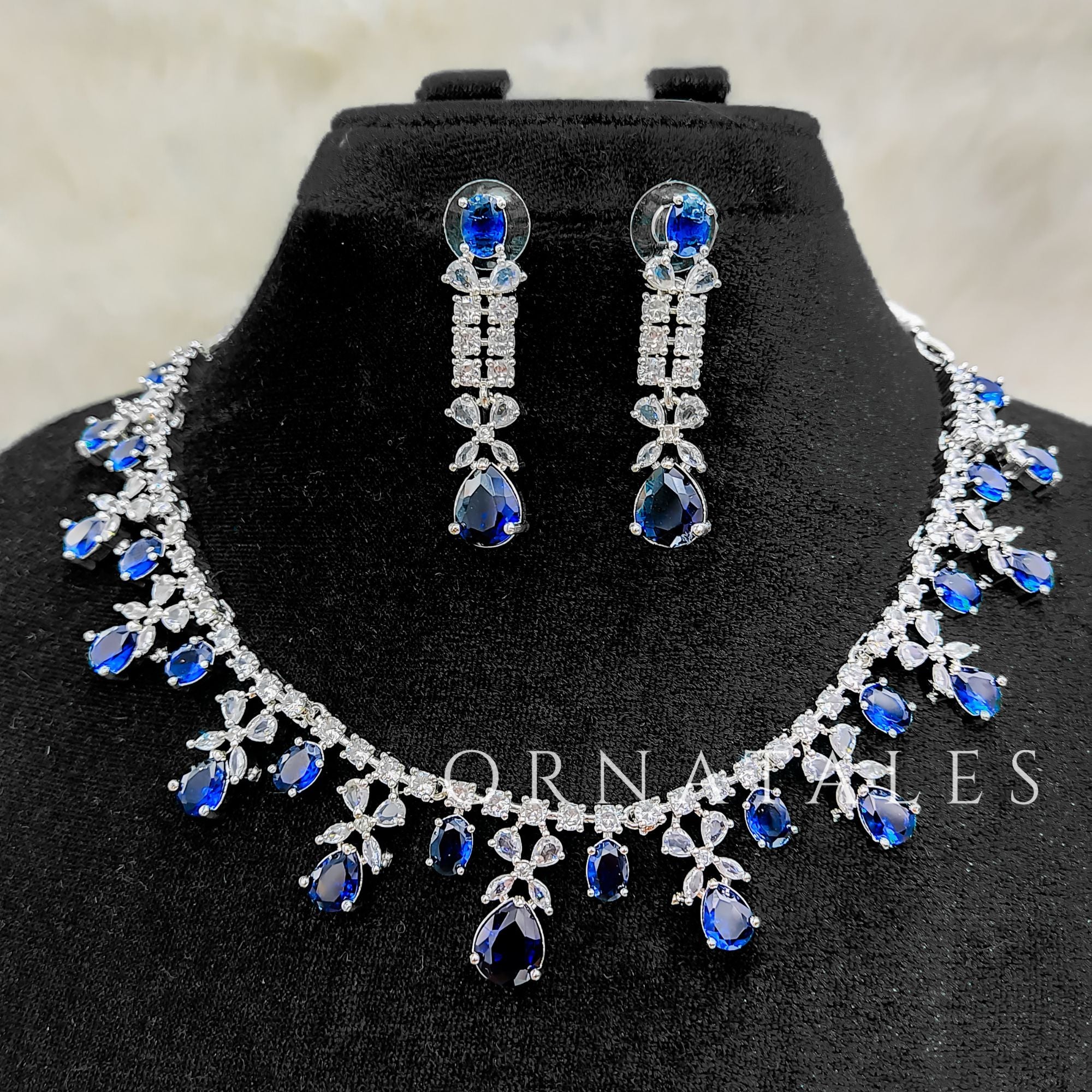 Royal Blue Diamond Cut Necklace Set featuring cascading teardrop stones and clustered diamond detailing – Ornatales