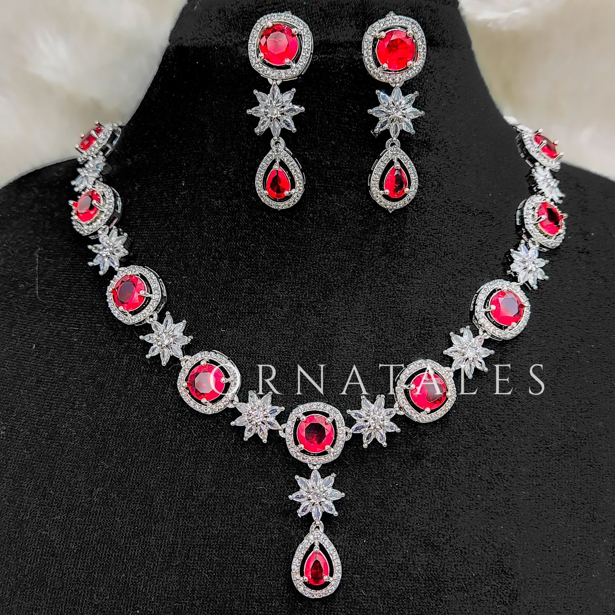 Ruby Red Diamond Cut Necklace Set with starburst motif and teardrop accents – Ornatales