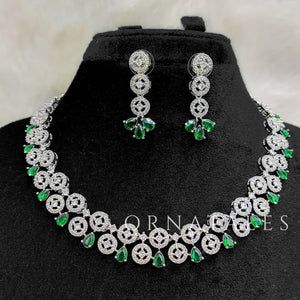 Emerald Green Diamond Cut Necklace Set featuring floral cluster and teardrop stones – elegant bridal jewellery – Ornatales