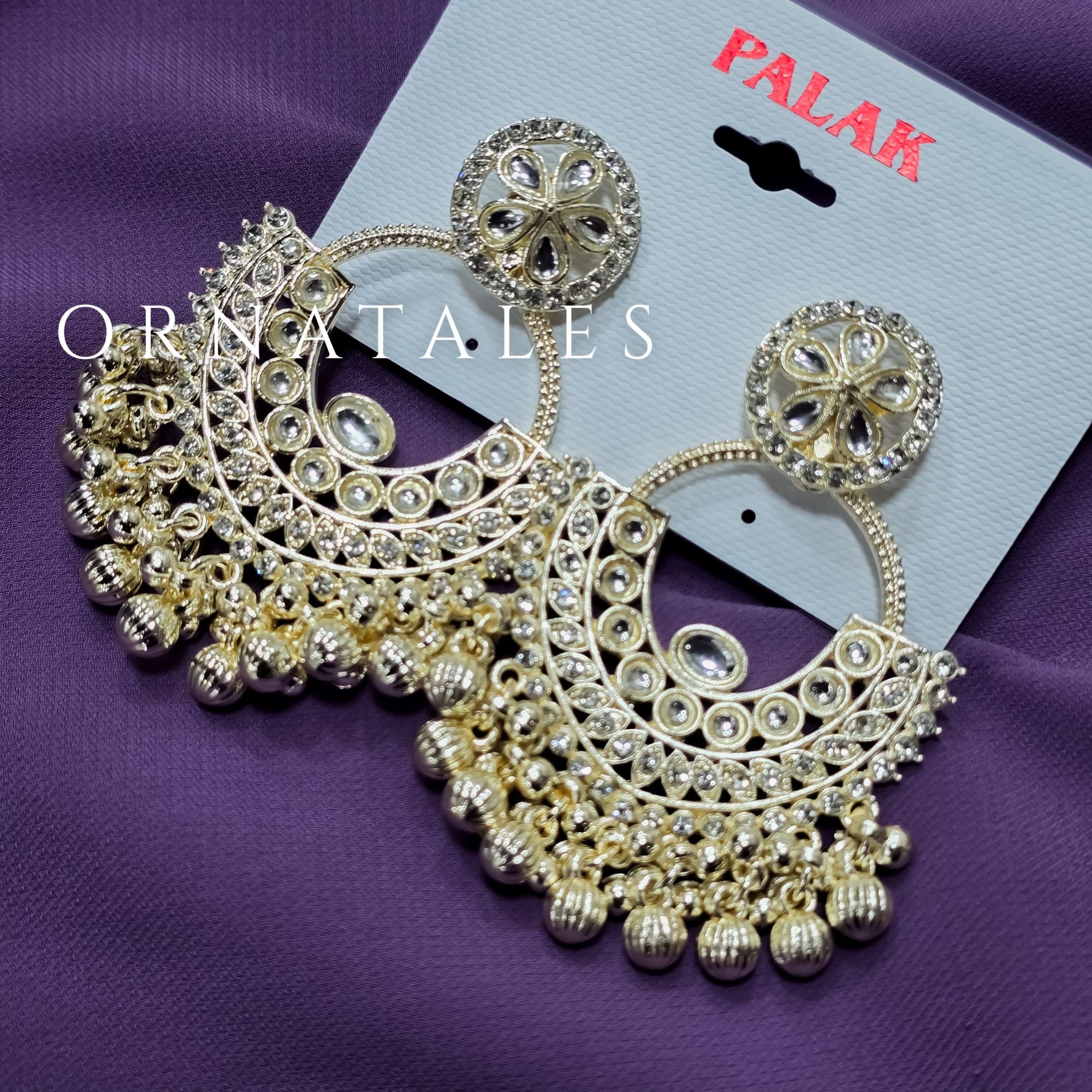 Perfect for brides & festive occasions, these white Multani Kundan Chandbali earrings feature intricate motifs with pearl drops. Fast home delivery across Bangladesh.