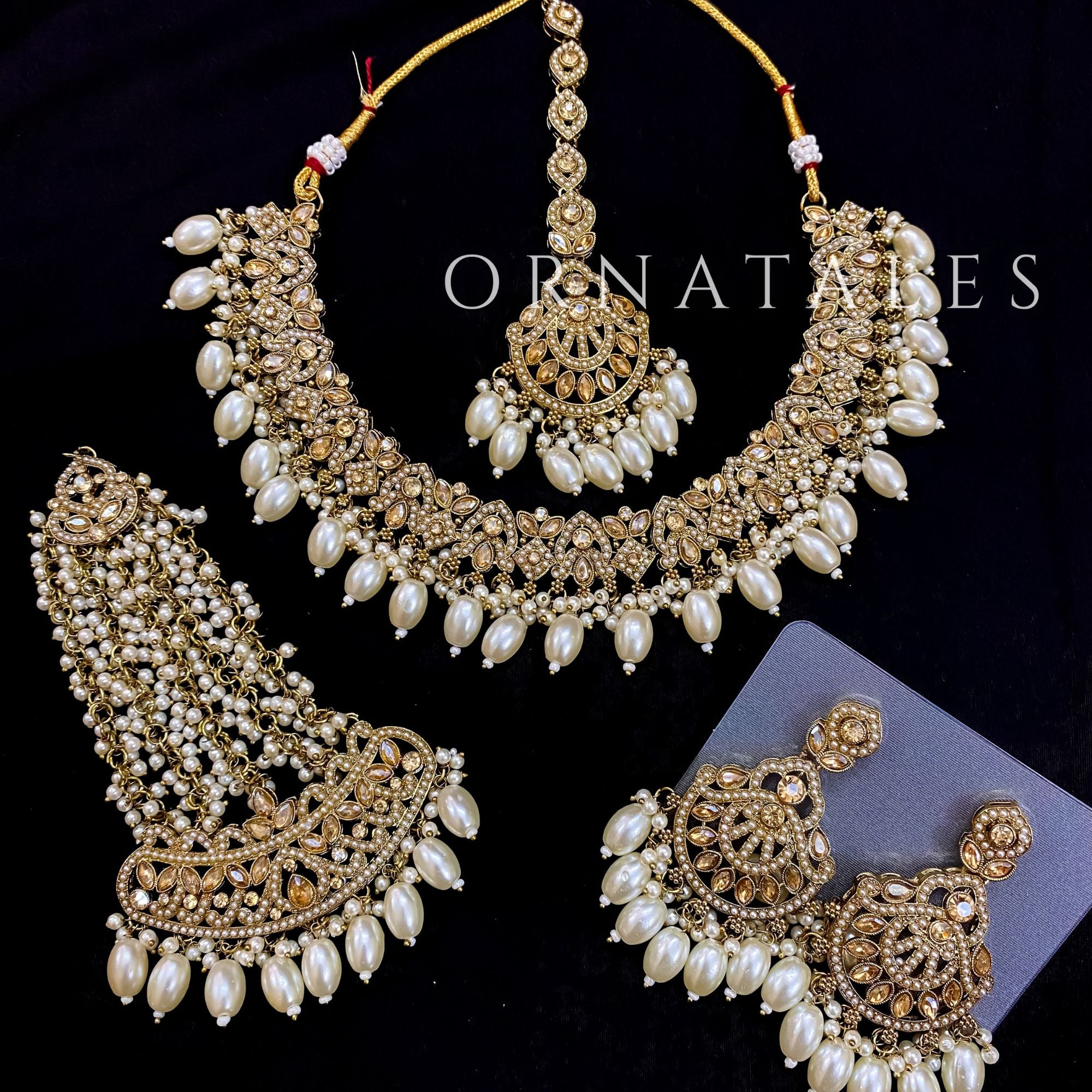 Pakistani bridal necklace set with small stone work and pearl drops including earrings and tikli – Ornatales