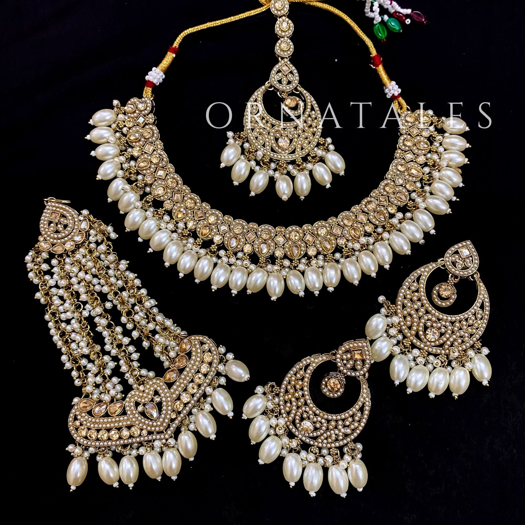 Pakistani bridal necklace set with small stone work and pearl drops including earrings and tikli – Ornatales