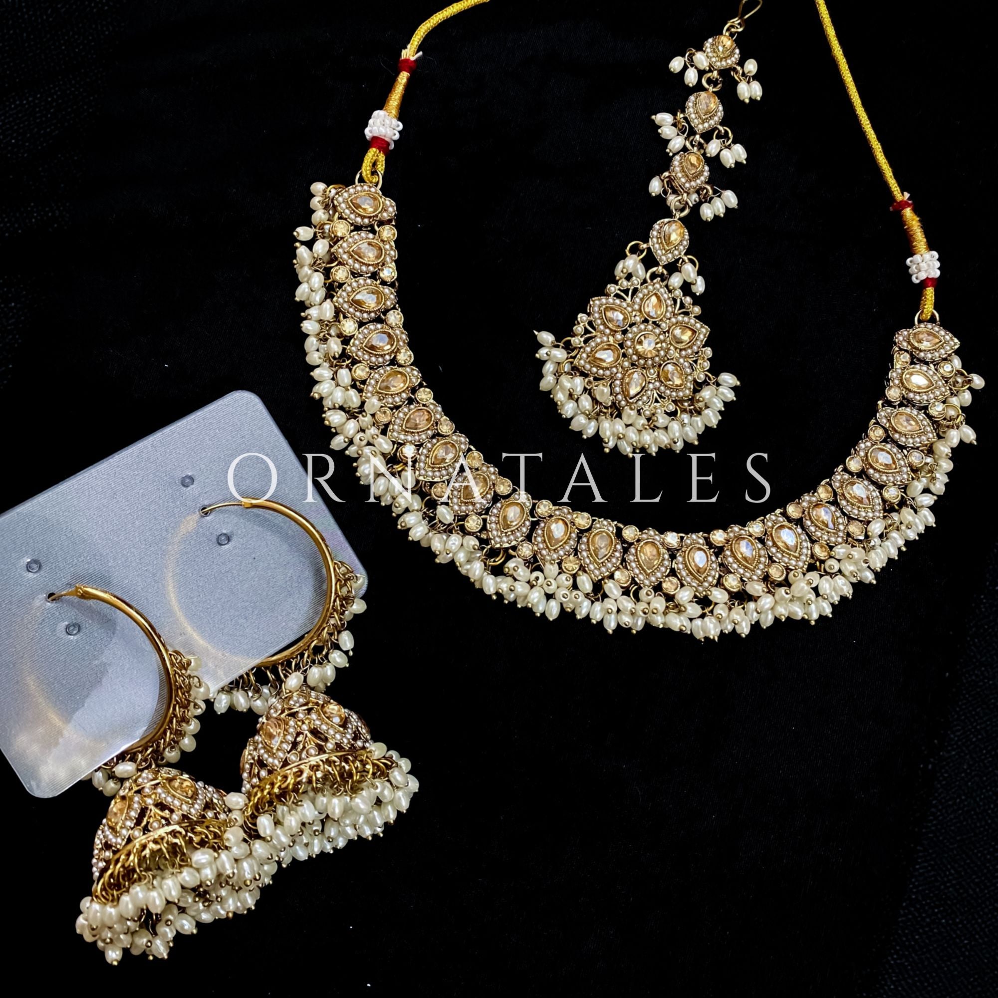 Pakistani bridal necklace set with small stone work and pearl drops including earrings and tikli – Ornatales