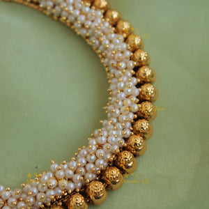White Traditional Gajra Necklace Set featuring double-layer white micro pearls and golden ball beads.